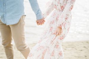 Light and airy film lakeside dock engagement session at Gray's Lake in Des Moines, Iowa