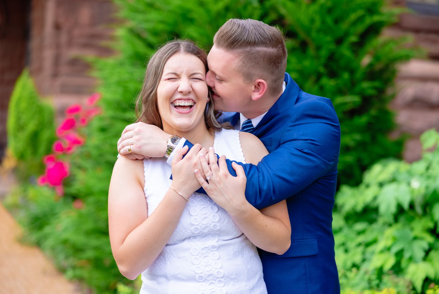 Engaged Couple Laughing During Engagement Session