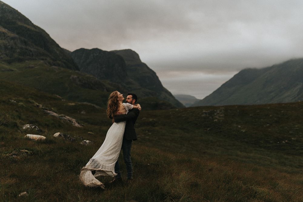 Intimate wedding photography session overlooking the dramatic valley landscape of Glen Coe in Scotland.