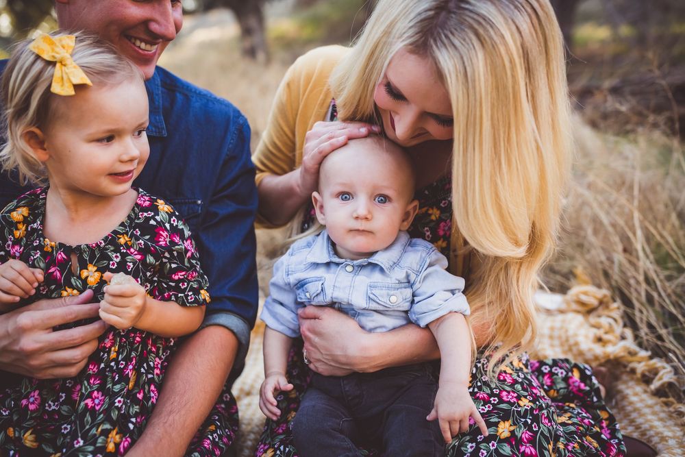 A series of outdoor family photos showing adults and children in casual wear amid a natural setting during golden hour.
