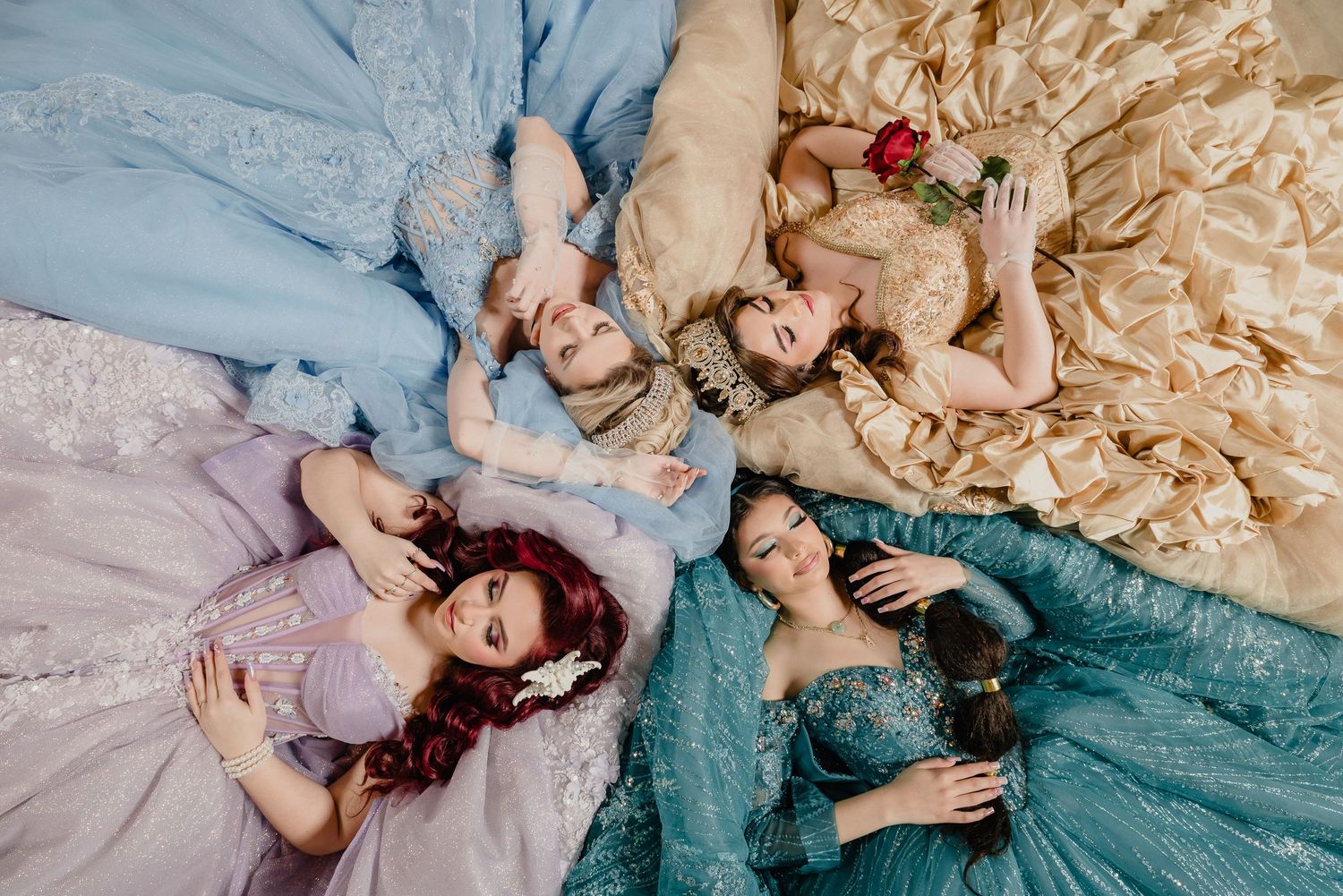 Sacramento quinceanera photographer captures 4 Disney princesses during their photoshoot. Cinderella, Belle, Ariel and Jasmine.