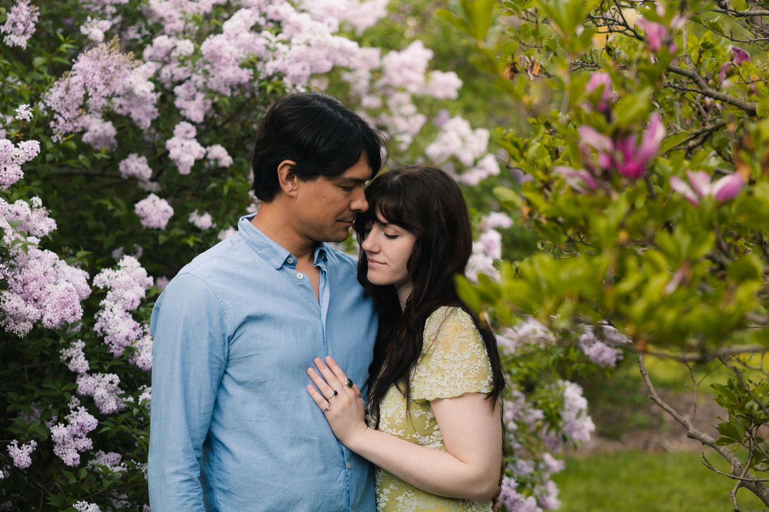 madison wi engagement couple photoshoot professional photographer spring uw arboretum cherry blossom trees lilacs middleton verona deforest