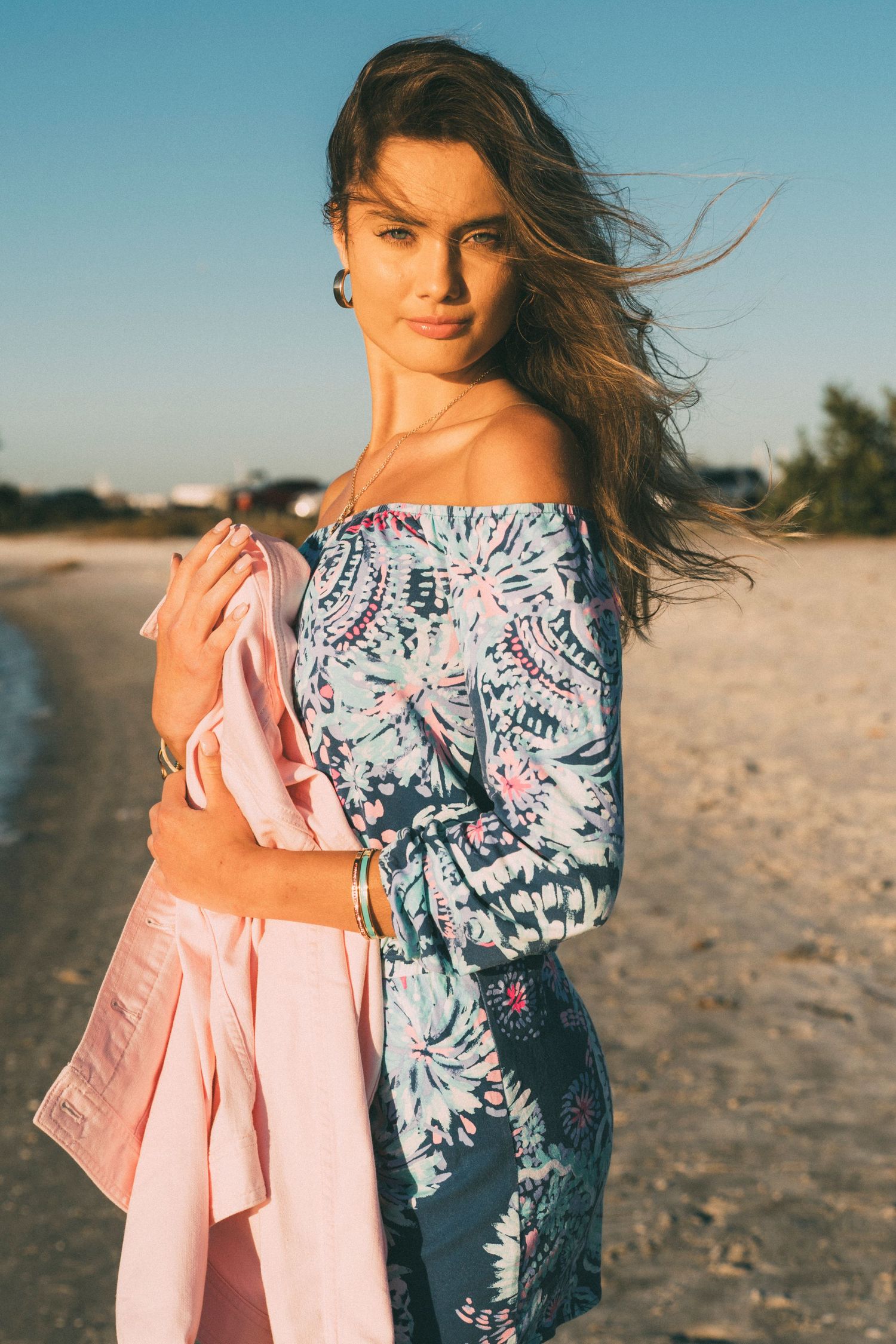 Editorial fashion photoshoot in Tampa featuring golden hour lighting on beach