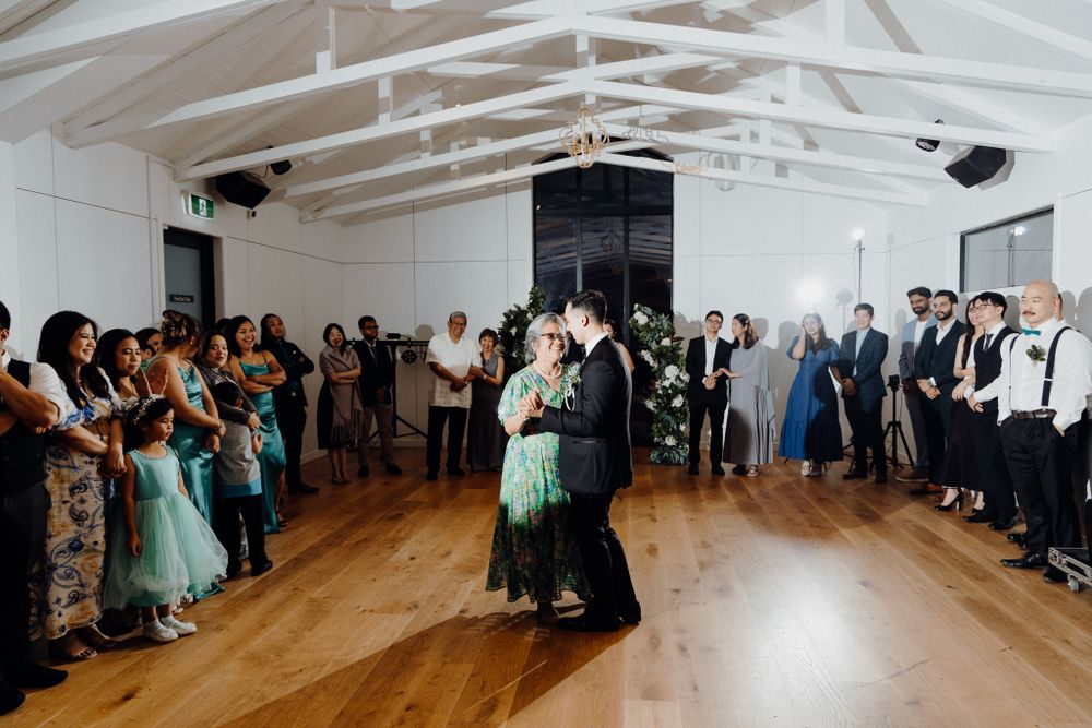 A mom and son moment captured by Apertured Media Auckland Wedding Photographer.