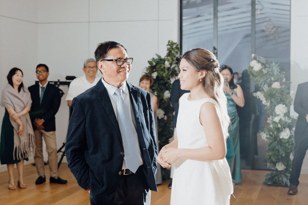 The dad and daughter moment captured by Apertured Media Auckland Wedding Photographer.