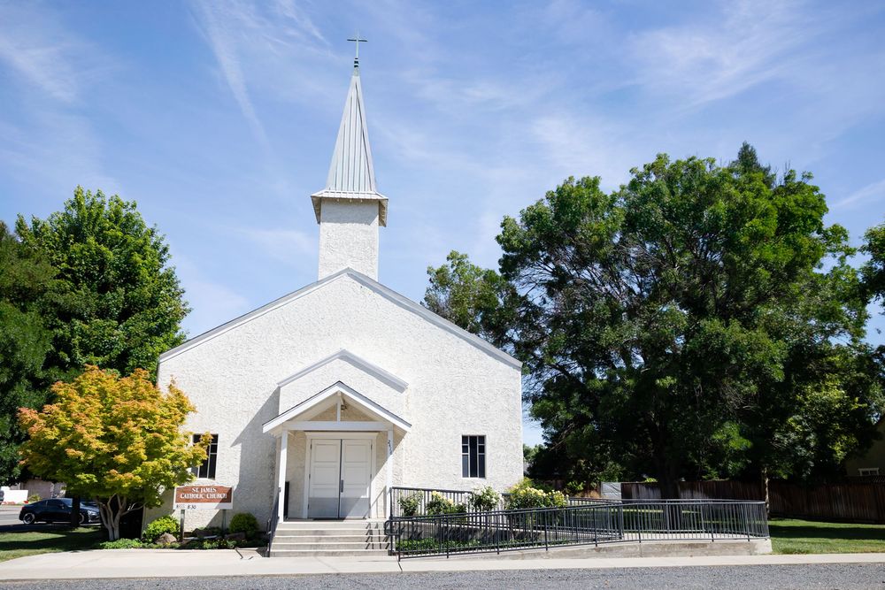 Exterior shots of a white church building with steeple against a bright blue summer sky.