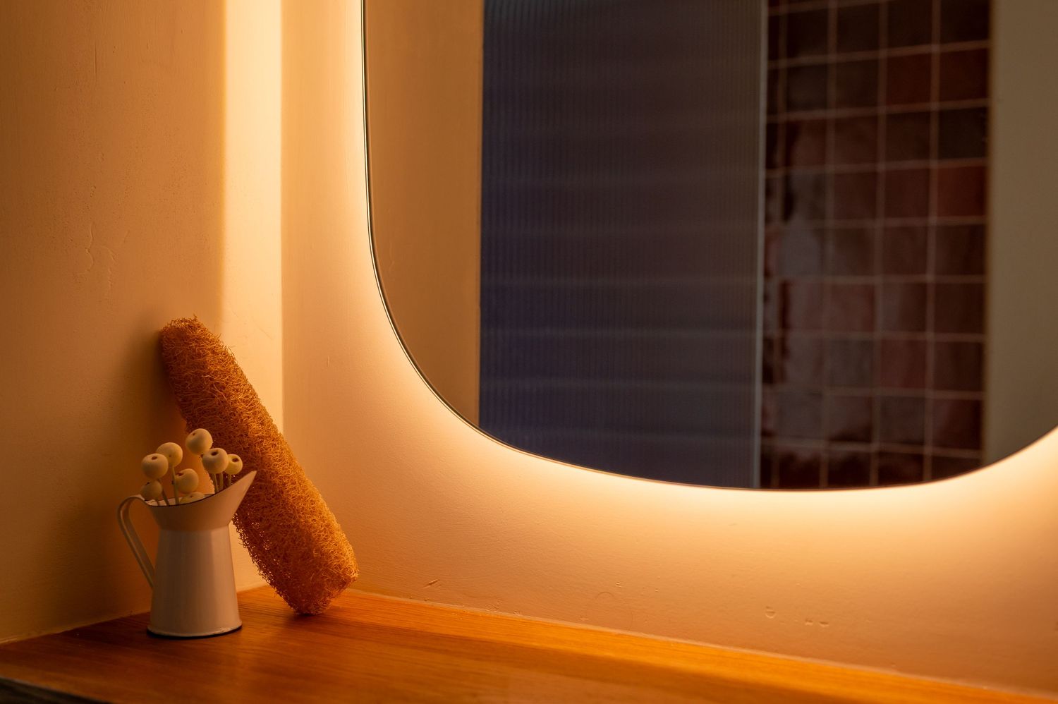 bathroom mirror with light warm tones