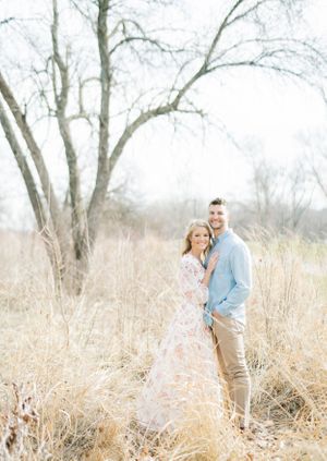 Light and airy film lakeside dock engagement session at Gray's Lake in Des Moines, Iowa
