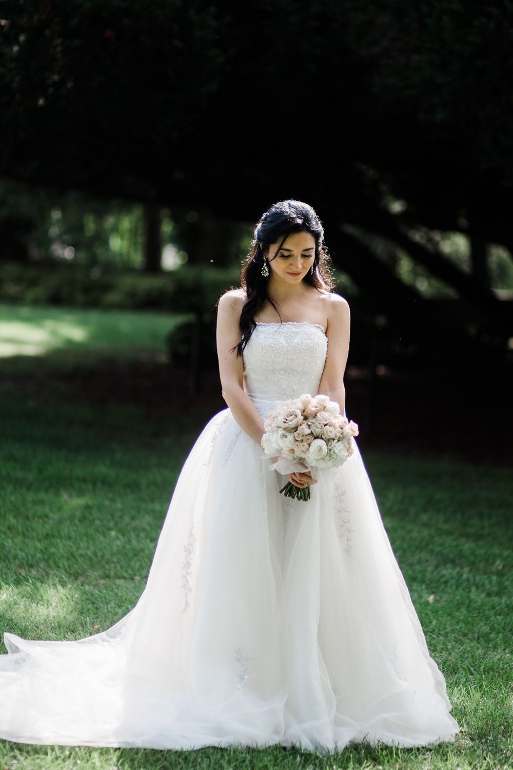 Bride wearing sleeveless tulle gown