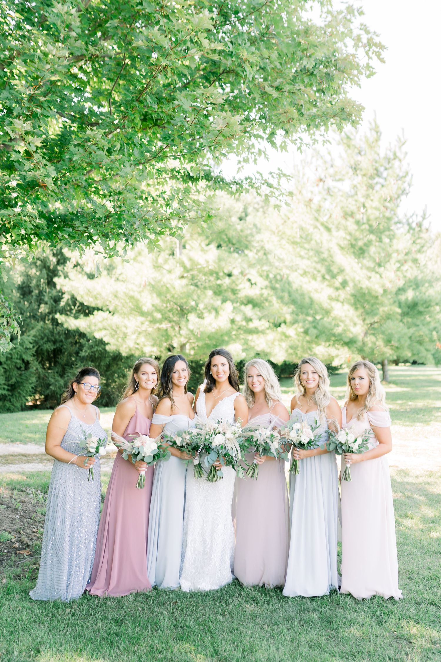 Light and airy spring Des Moines wedding with pastel colors at Winery in Iowa