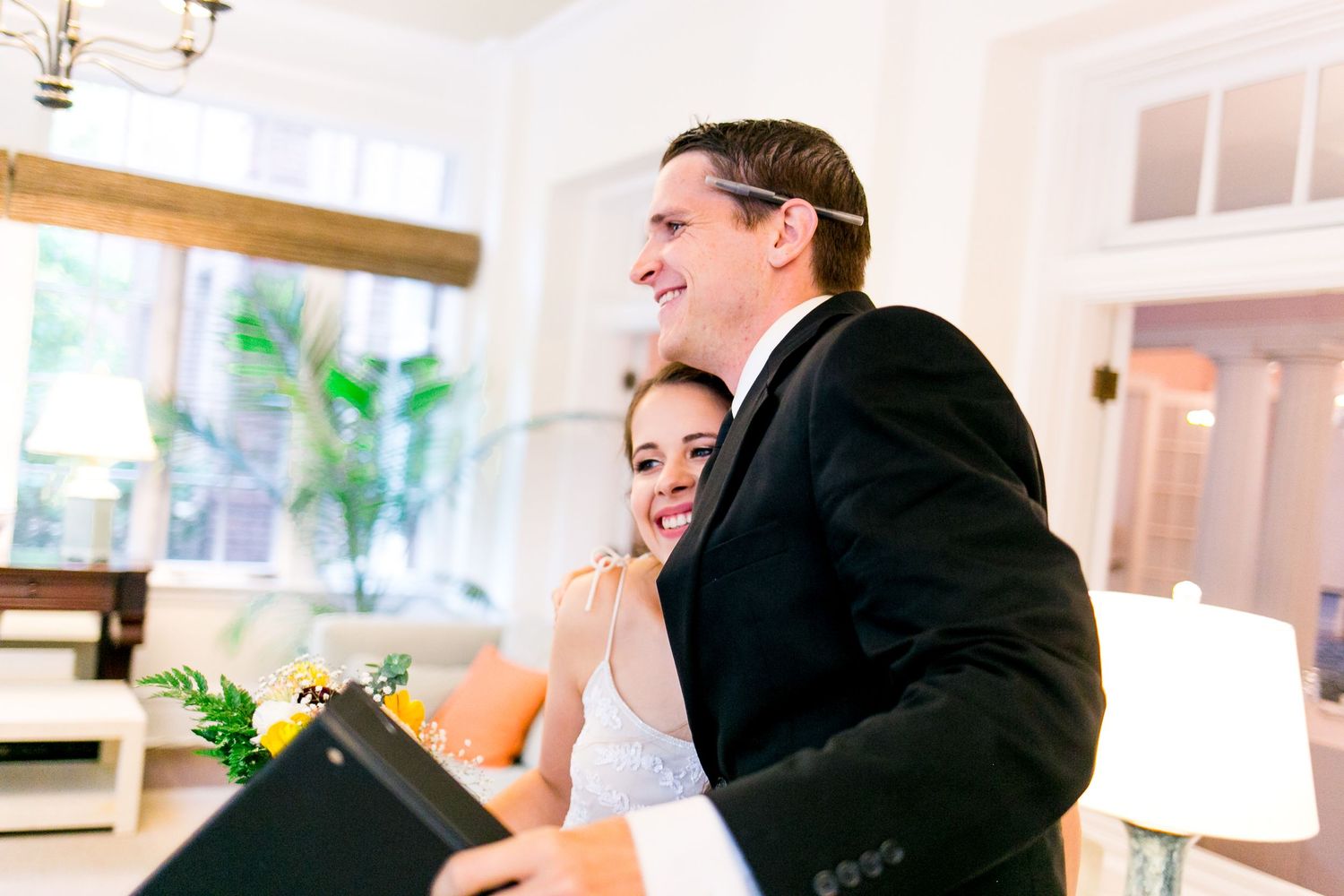 bride hugging her wedding officiant at the Woman's Club of Evanston for Chicago brunch wedding