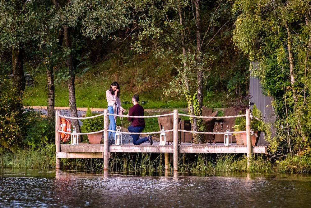Paparazzi proposal photoshoot at Gilpin Lake House in Cumbria