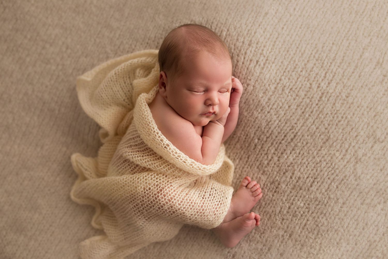 newborn child sleeping side cute baby knit blanket
