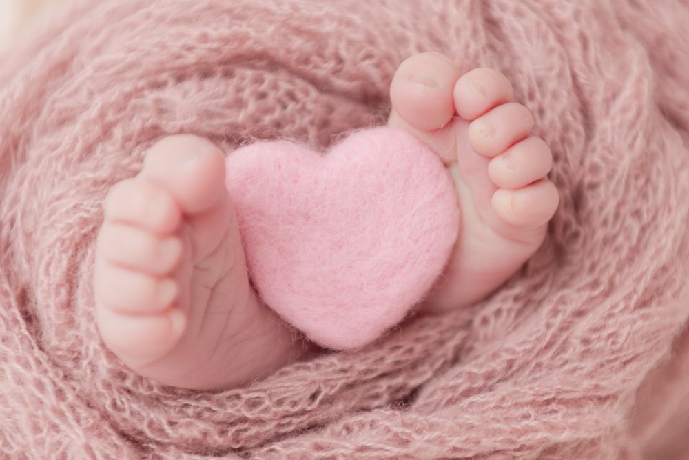 Babyvoetjes gaan natuurlijk ook op de foto. Zo lief met een hartje ertussen.