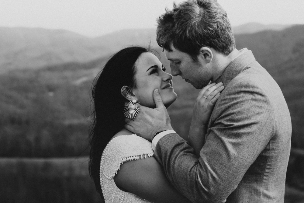 woman looking adoringly at her new husband during their blue ridge mountains full day elopement