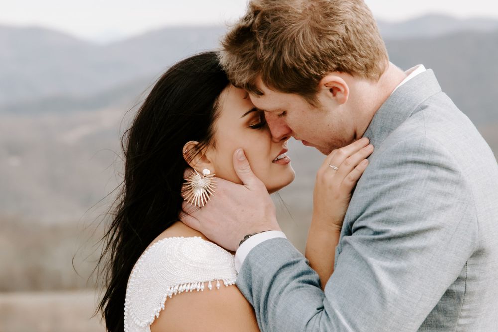 couple about to kiss in the mountains during their Smoky Mountain elopement
