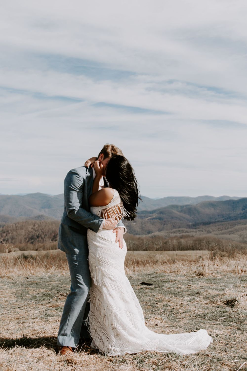 newly wed couple kissing after saying their vows during their Carolina elopement