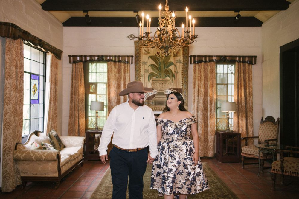 Beautiful couple walking in quinta mazatlan for their engagement session. McAllen wedding photographer