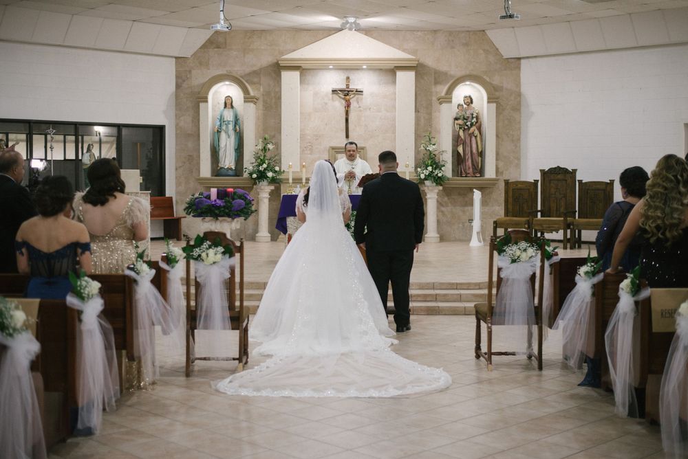 bride and groom at the altar at the church. Mcallen photography