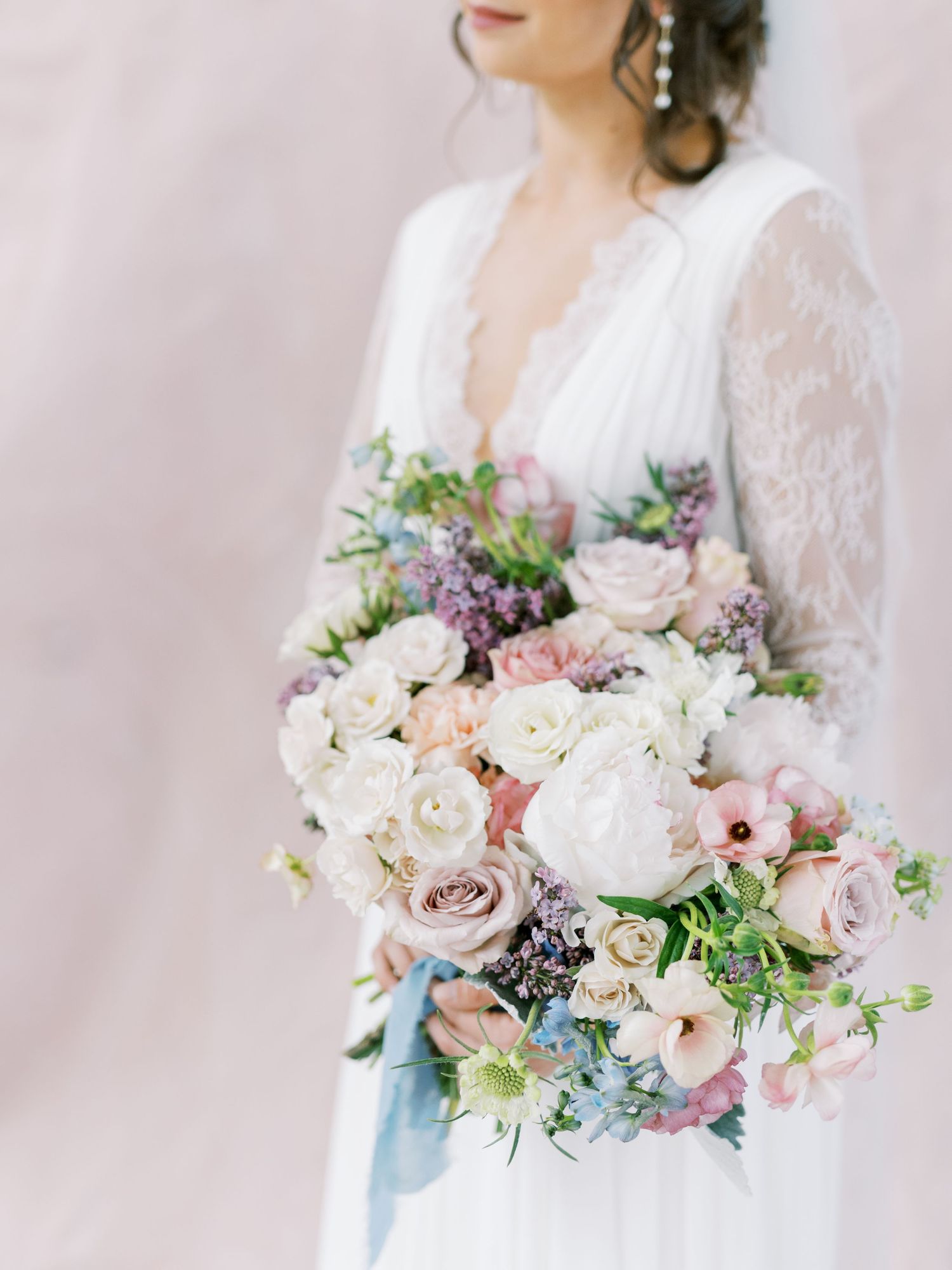 Wedding day getting ready photos at Emerald Hills in Promise City, Iowa with blush and neutral florals