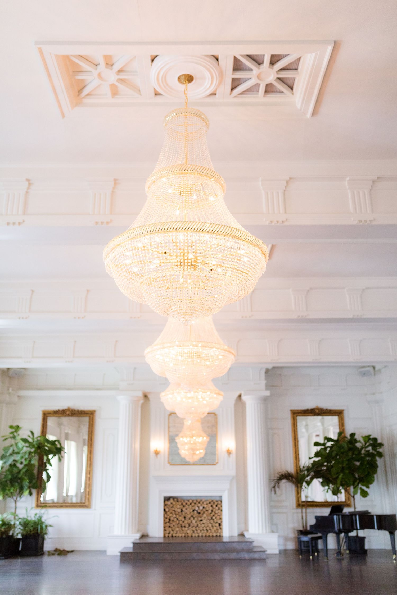 Sparkling chandeliers in the ballroom at The Mason Dallas.