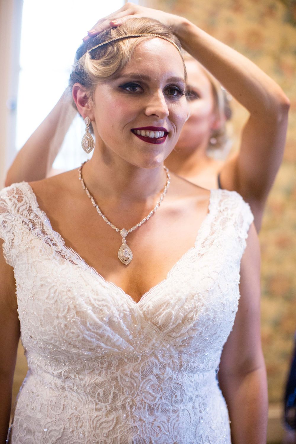 bride getting her veil attached in dressing room at Monday Club in San Luis Obispo