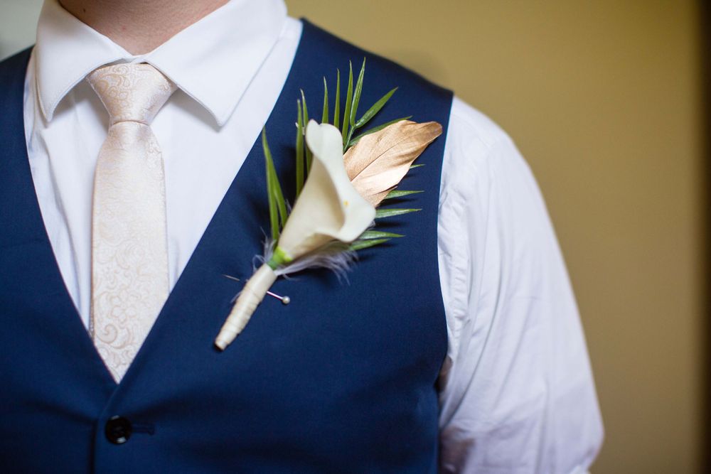 close up of grooms boutonniere at Monday Club in San Luis Obispo