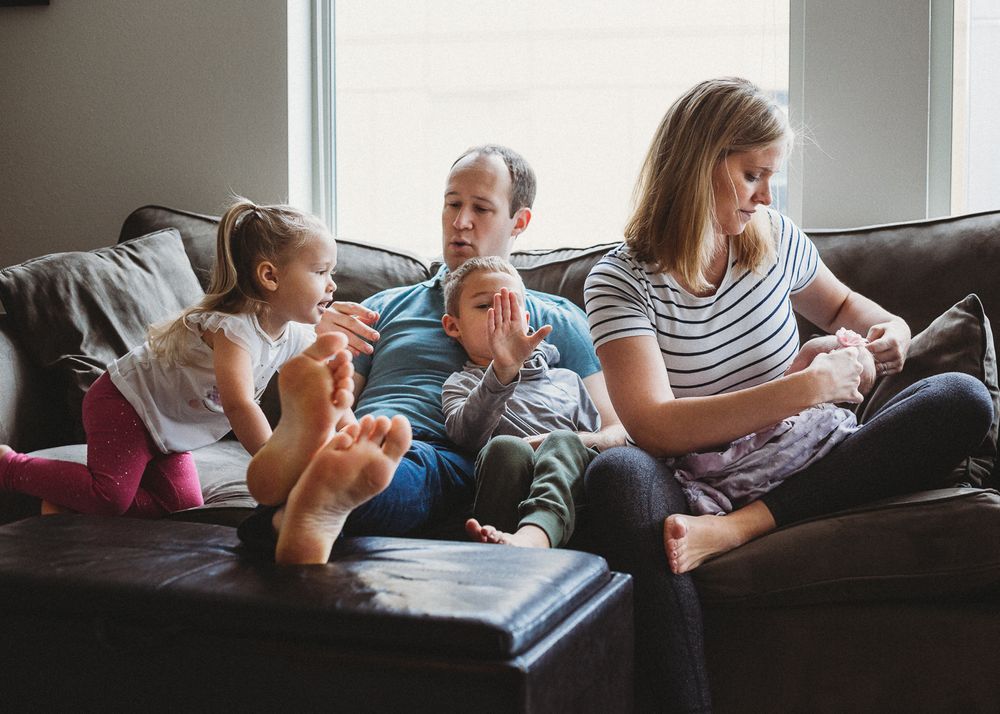 lifestyle newborn session Seattle getting ready