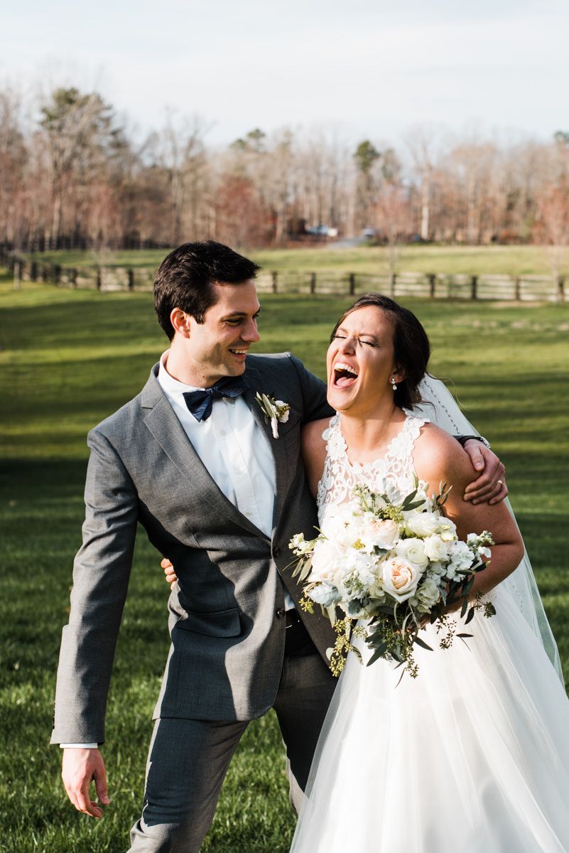 bride and groom laughing at Rolling Hill Farm
