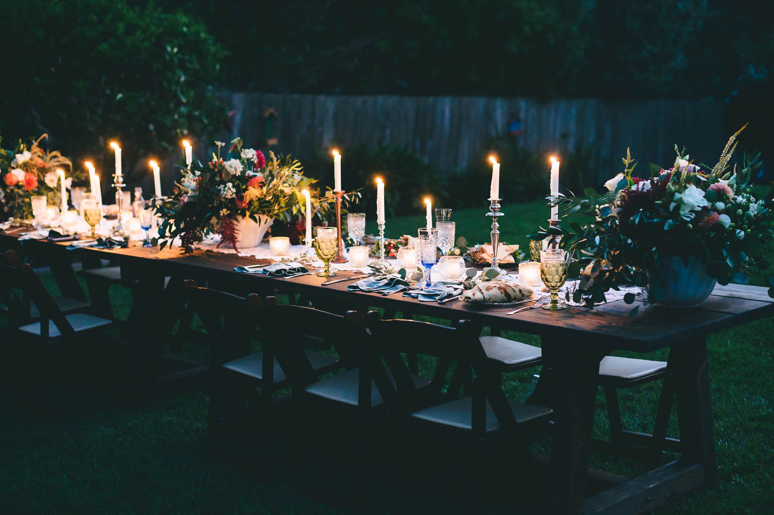 DIY decor with candles and colorful glass wear at this intimate backyard wedding in Santa Cruz