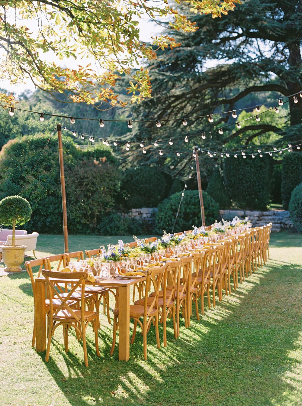 Relish in the charm of La Bastide de Ganay, Provence, while dining outdoors in a spacious seating area.