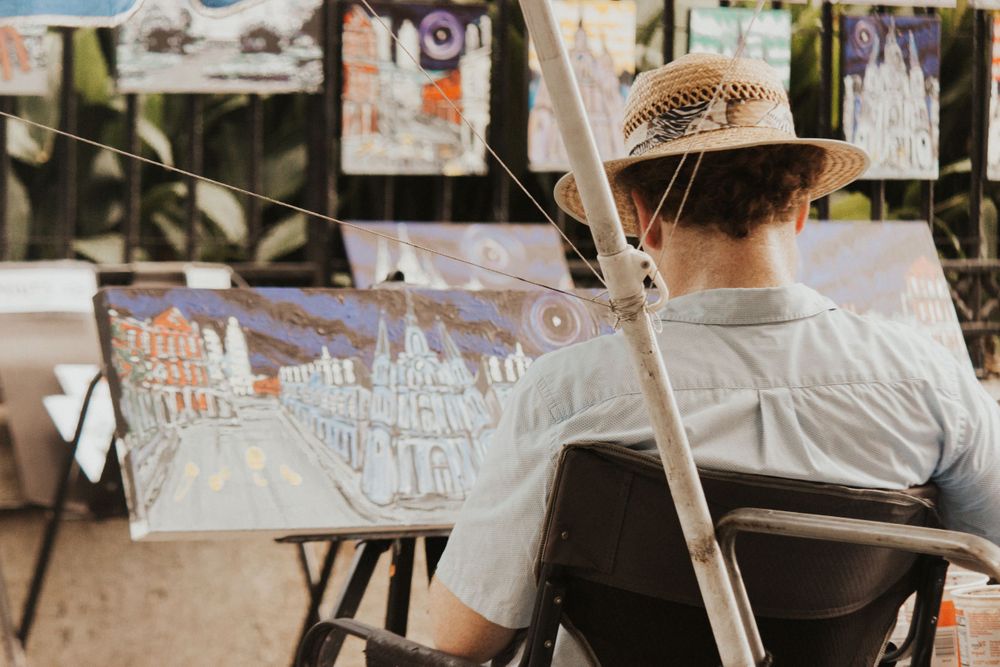 artist working in Jackson Square during a New Orleans Elopement