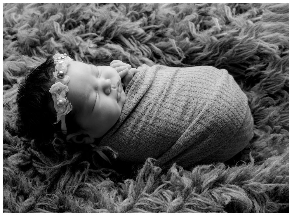 austin newborn photographer low key newborn profile portrait by Austin Newborn Photography