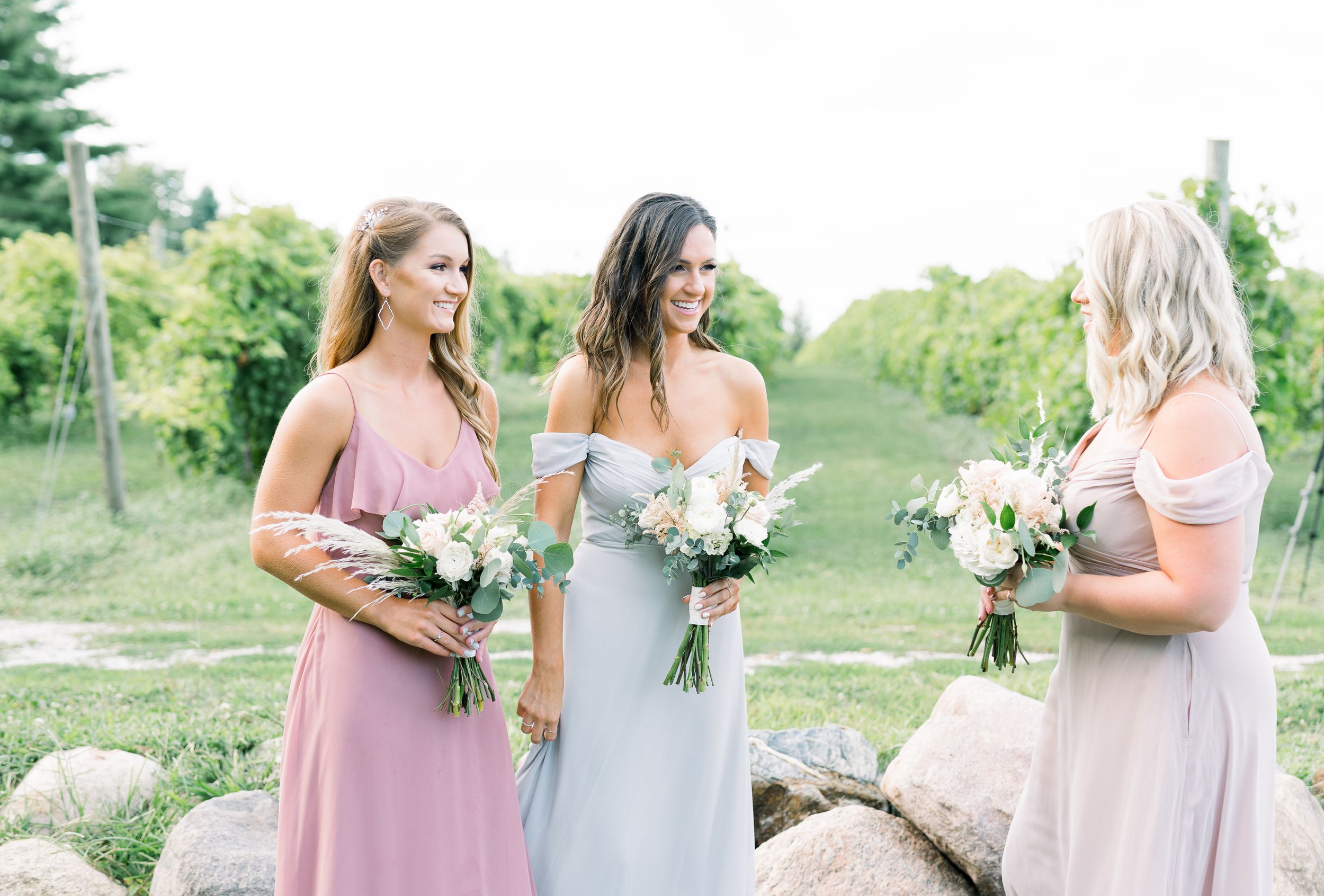 Vineyard photos with white willow events at Prairie Moon Winery wedding in Ames, Iowa