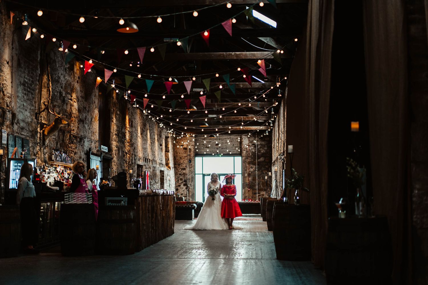 Kinkell Byre Wedding Photography, Bride and Mother walk down the aisle in the barn