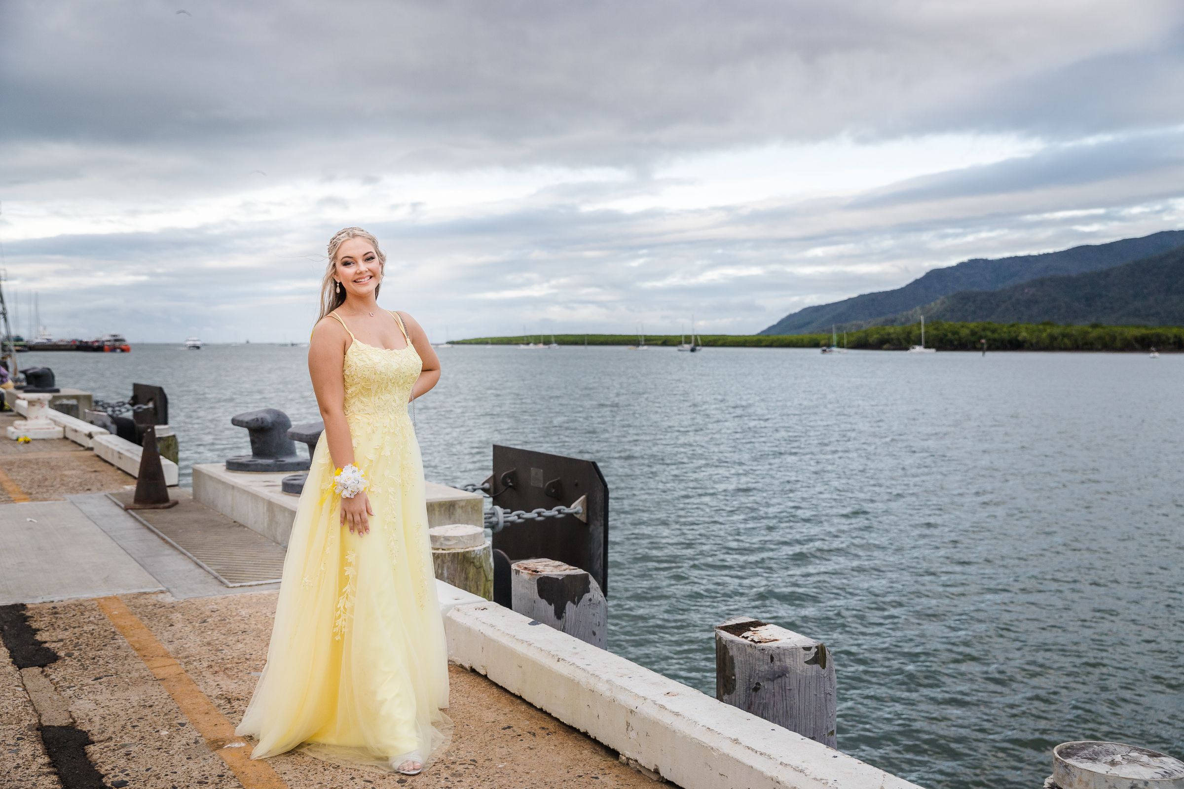 Highschool formal graduate posing at Cairns Cruise Liner Terminal