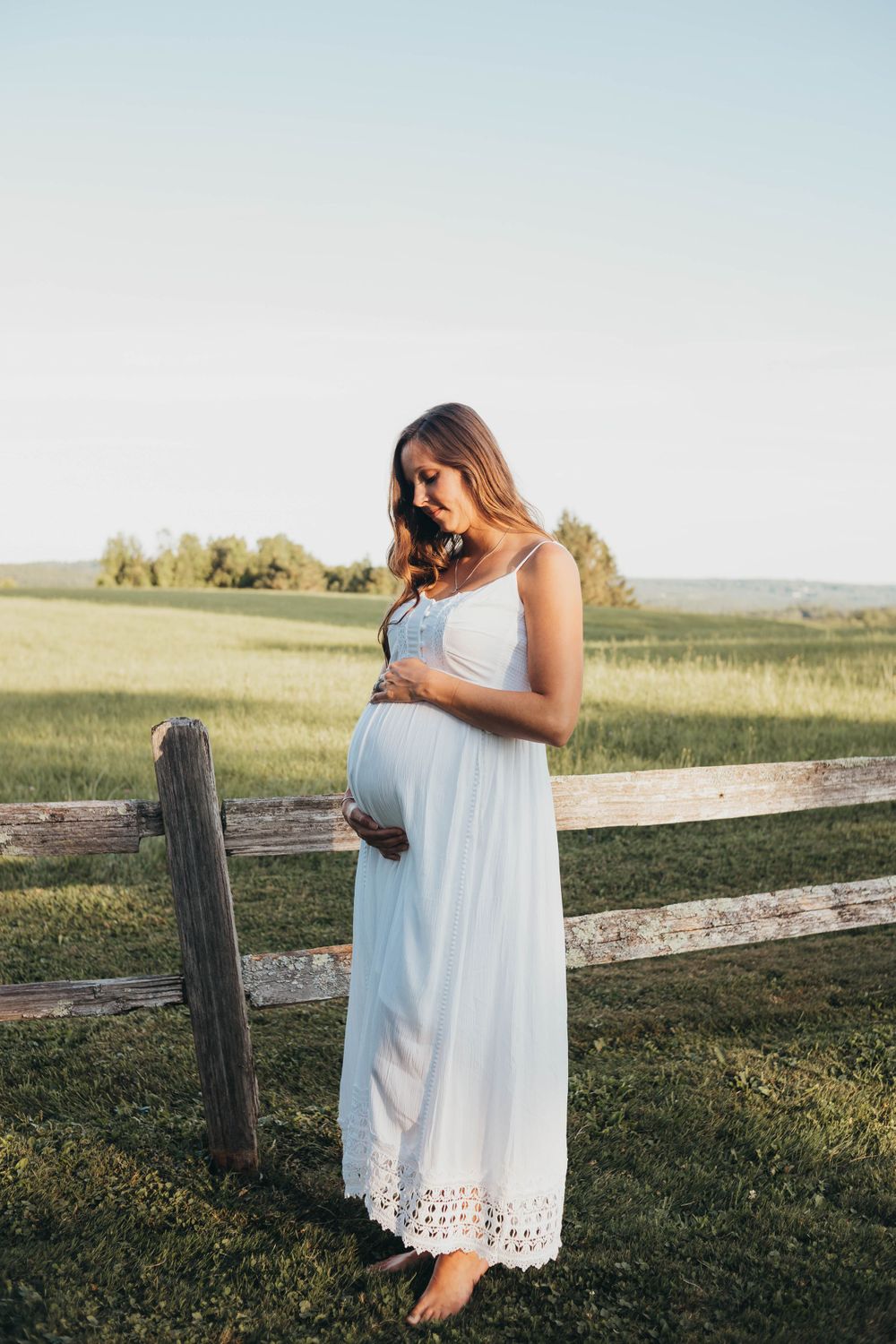 mom cherishing her pregnancy by boston newborn photographer