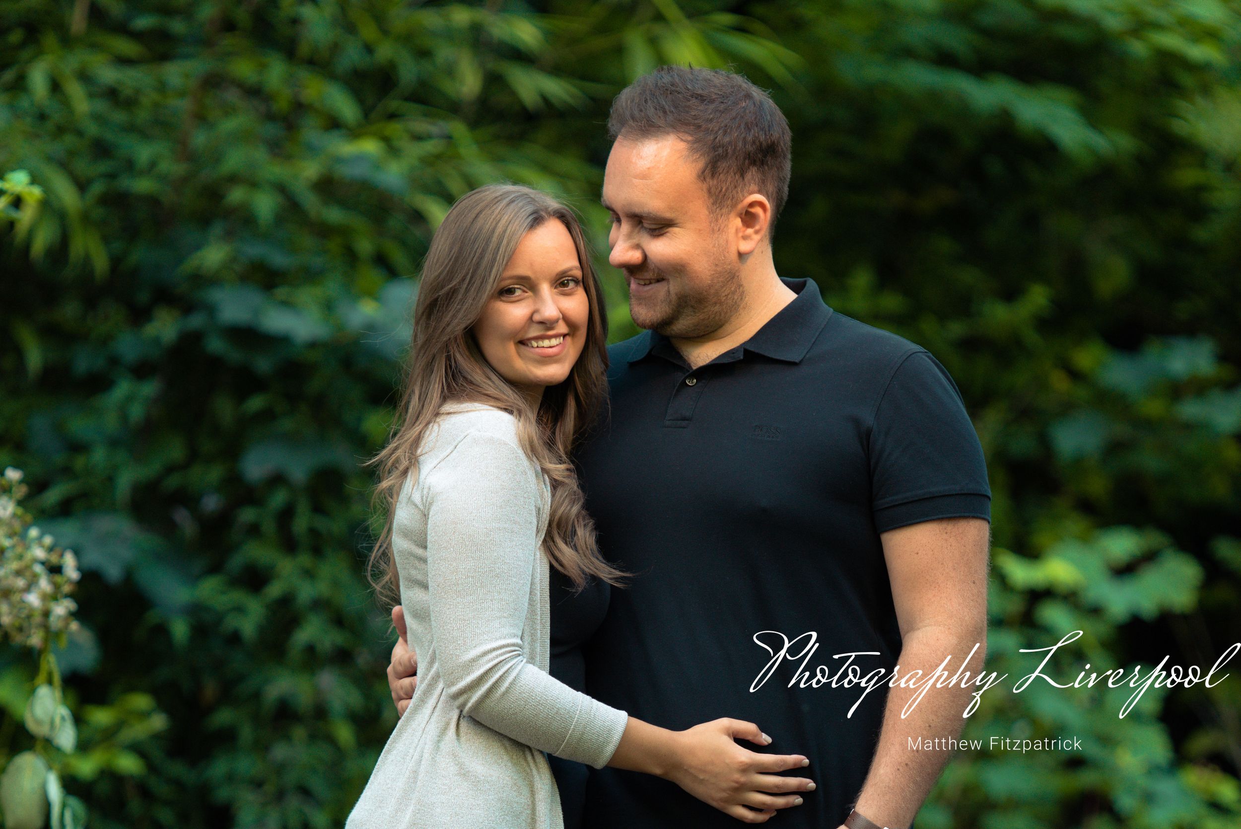 Naturally posed engagement photography at Sefton Park by Photography Liverpool Wedding Photographer