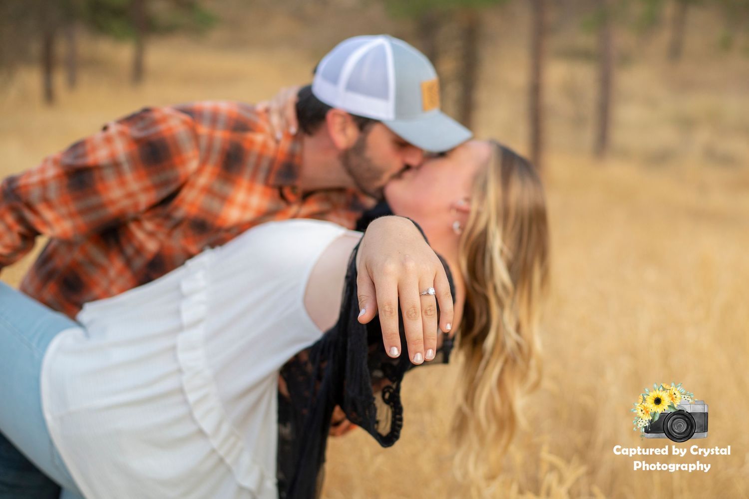 An engaged couple pose for their engagement photoshoot in Ellensburg, Washington.