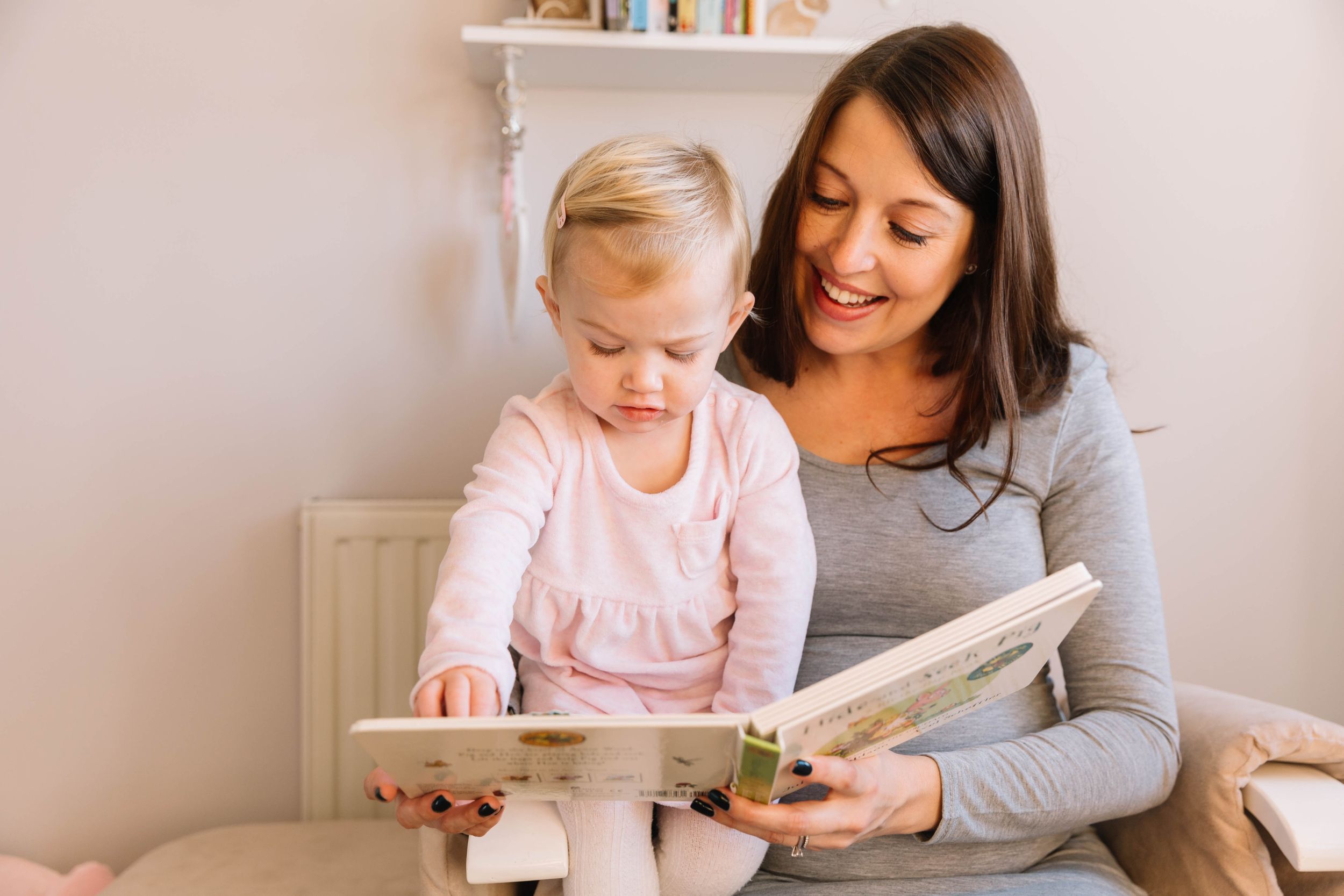 pregnant photos at home with little girl