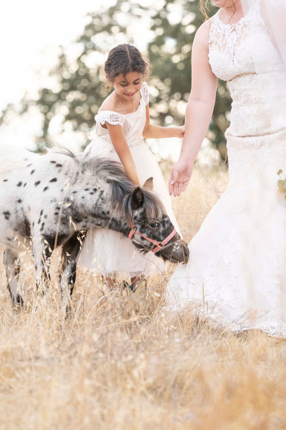 Flower girl with a pony at Fallen Oaks Estate
