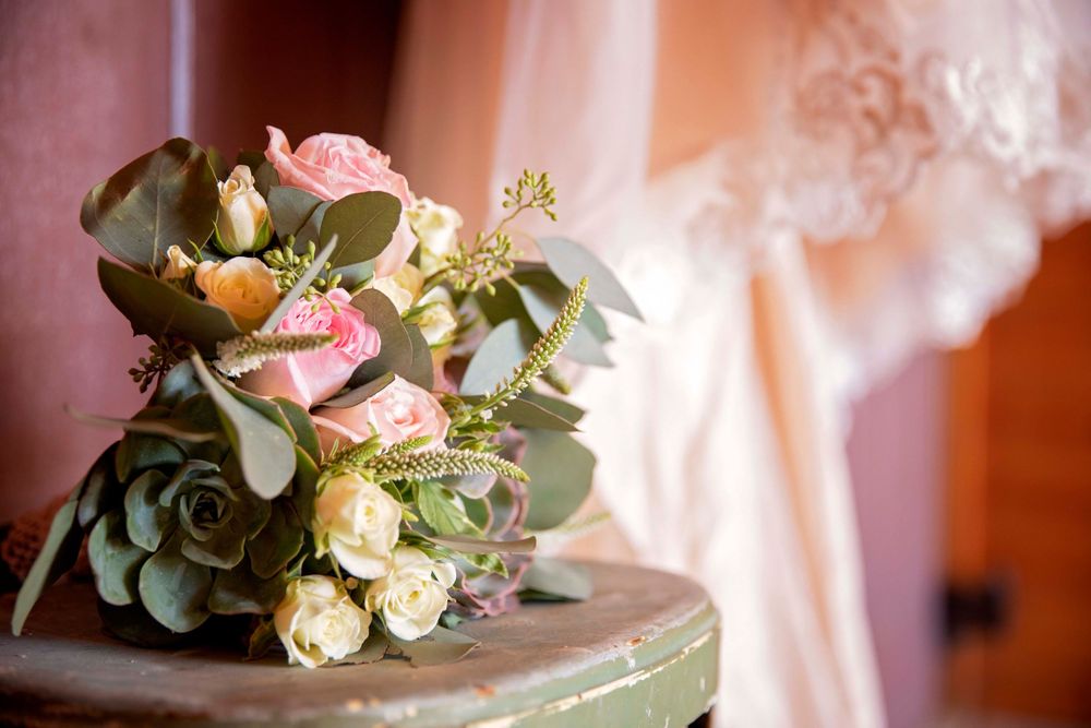 bride's bouquet on a vintage step stool