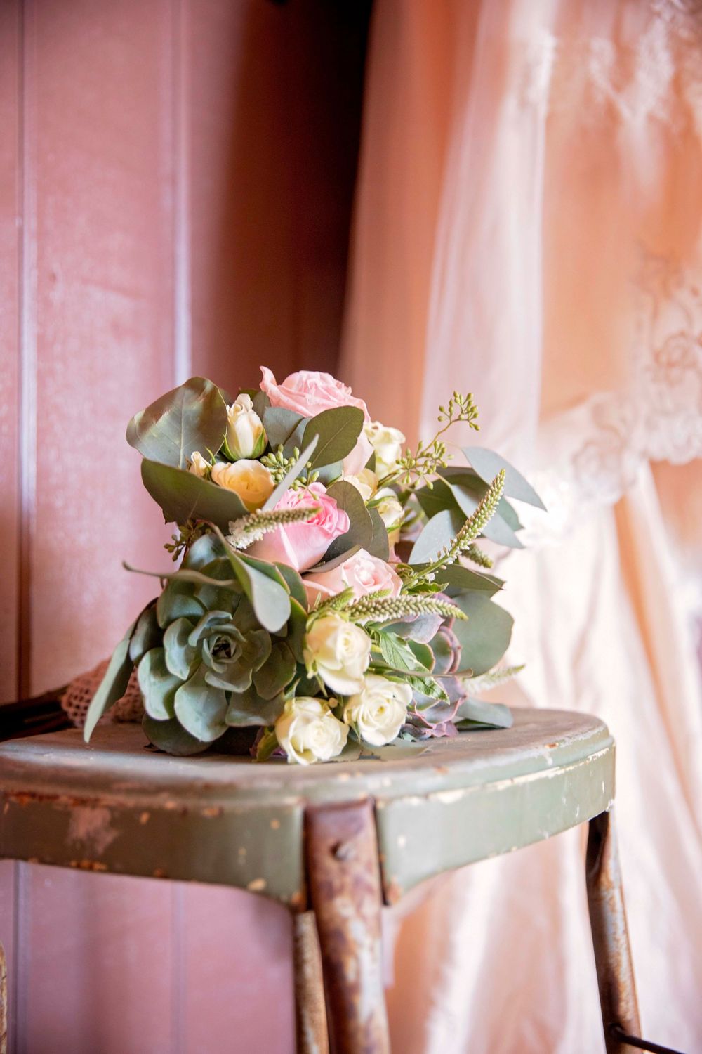 wedding bouquet on a vintage step stool