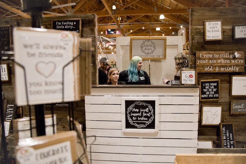 Pinology Puyallup Karter Designs owner of booth hand made signs with shocking sayings