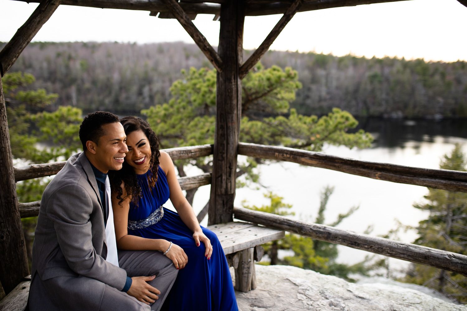 Engaged couple laughing at Minnewaska State Park