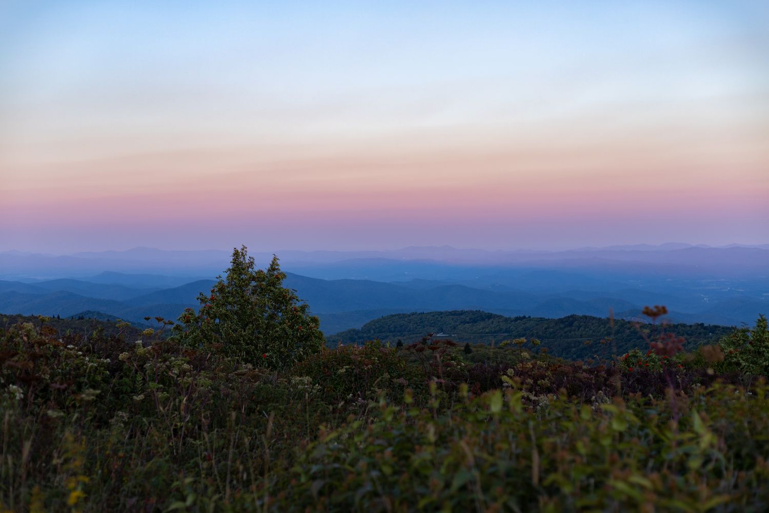 A sunset view of the Blue Ridge Parkway near Asheville, NC.
