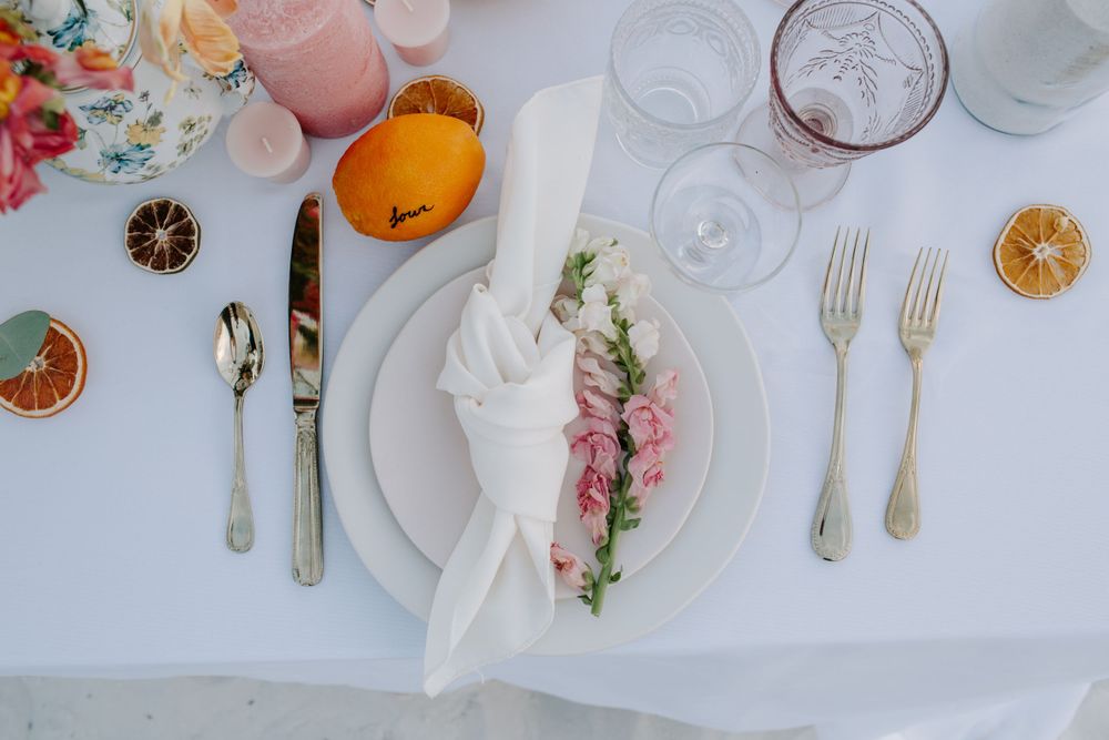 top down view of the couples wedding table that is citrus themed during their Florida elopement