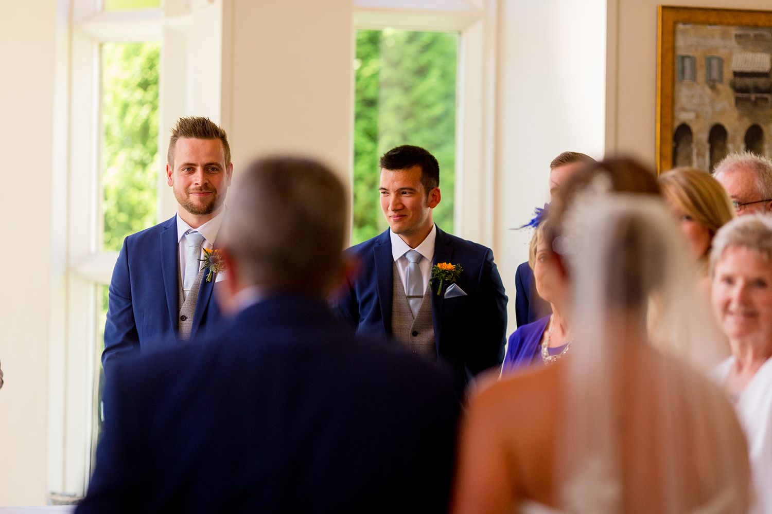 groom seeing bride for first time at ceremony