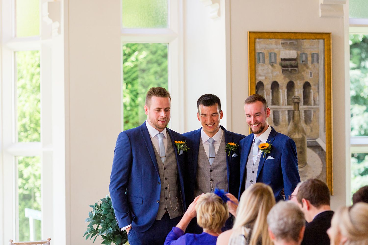groom waiting at aisle ceremony