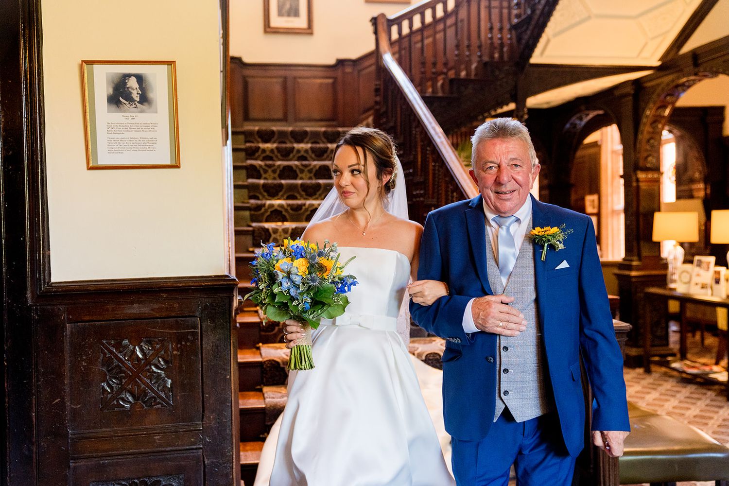 staircase bride and dad